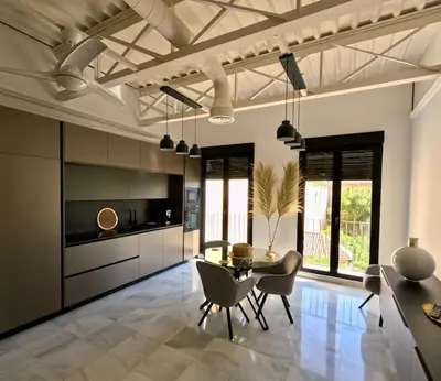 Una cocina o zona de cocina en Loft Puerta de Capitulares
