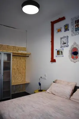 Cama o camas de una habitación en Sevilla Urban Flat