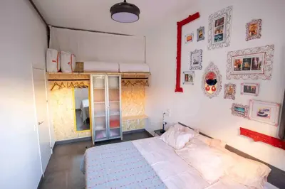 Cama o camas de una habitación en Sevilla Urban Flat