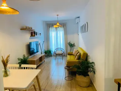 Una televisión o centro de entretenimiento en Apartamento Las Minas
