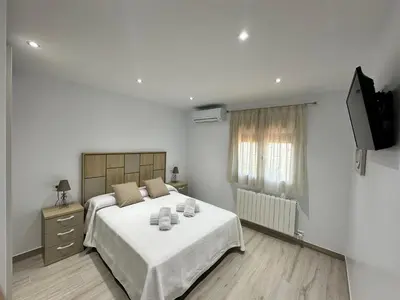 Cama o camas de una habitación en La Villa de Alba - Casa Rural en Montefrío