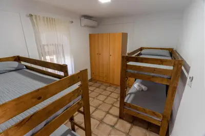 Cama o camas de una habitación en EL NOGAL