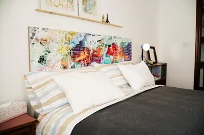 Cama o camas de una habitación en Apartamento turístico Travelers