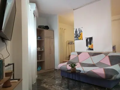Una televisión o centro de entretenimiento en Apartamento turístico Travelers