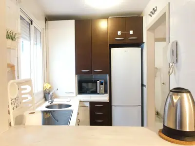 Una cocina o zona de cocina en APARTAMENTO SAN LUIS. Plaza de Parking Gratis!!!