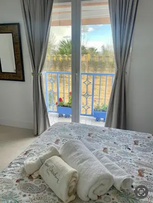 Cama o camas de una habitación en Casa Muralla del Alcazar Viejo