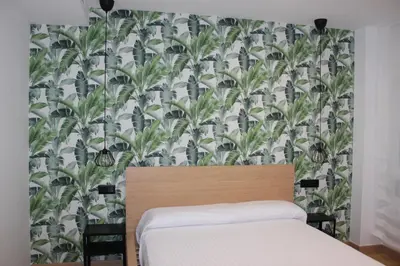Cama o camas de una habitación en Fernando Quero 21