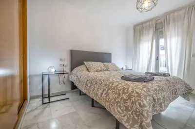Cama o camas de una habitación en Verso Andaluz, Parking junto al centro