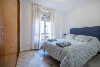 Cama o camas de una habitación en Verso Andaluz, Parking junto al centro