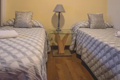 Cama o camas de una habitación en Hotel Rural Aznaitín