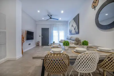 Una televisión o centro de entretenimiento en Apartamento DOMI & Parking Incluido
