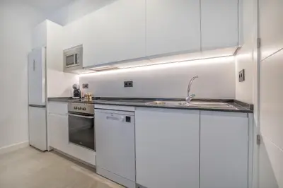 Una cocina o zona de cocina en Apartamento DOMI & Parking Incluido