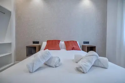 Cama o camas de una habitación en Apartamento DOMI & Parking Incluido