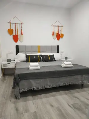 Cama o camas de una habitación en GRUPO LIMCOTEL EL MIRADOR DE LOS ABUELOS