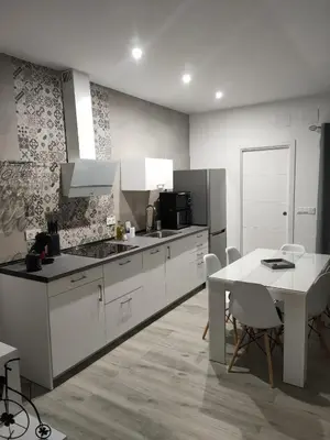 Una cocina o zona de cocina en GRUPO LIMCOTEL EL MIRADOR DE LOS ABUELOS