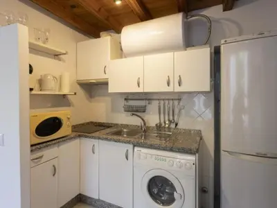 Una cocina o zona de cocina en San Leandro de Sevilla Oasis en el centro