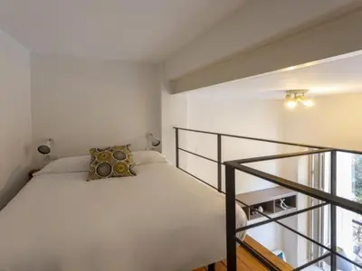 Cama o camas de una habitación en San Leandro de Sevilla Oasis en el centro