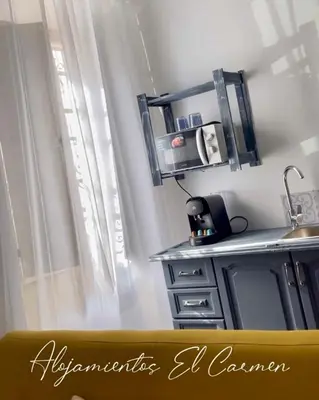 Una cocina o zona de cocina en Alojamientos El Carmen