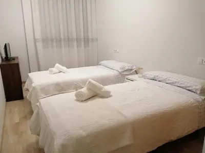 Cama o camas de una habitación en Apartamento La Muralla II