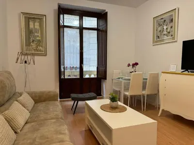 Una televisión o centro de entretenimiento en MR Apartamentos