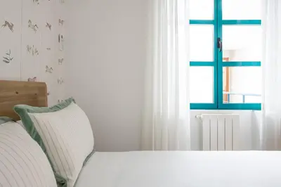 Cama o camas de una habitación en Alhondiga City Center Private House by Valcambre
