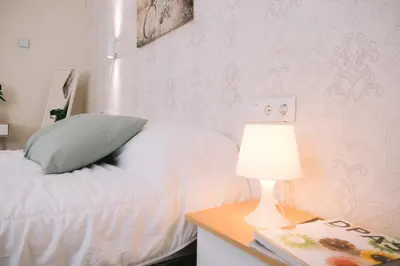 Cama o camas de una habitación en Piso compartido Delyrent, Reja
