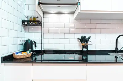 Una cocina o zona de cocina en EDomus Playa y Sol Boutique