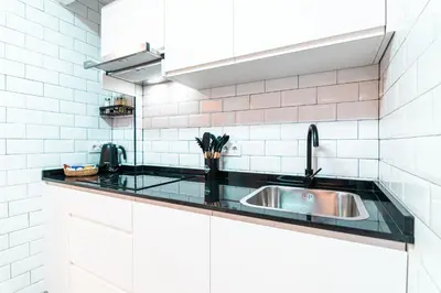 Una cocina o zona de cocina en EDomus Playa y Sol Boutique