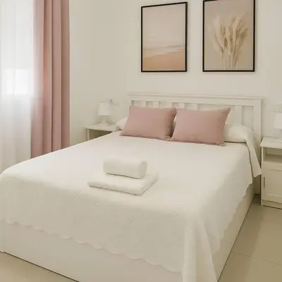 Cama o camas de una habitación en Alojamiento Baeza California 2B