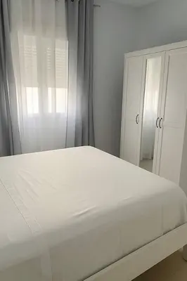 Cama o camas de una habitación en Alojamiento Baeza California 2B
