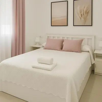 Cama o camas de una habitación en Alojamiento Baeza California 2B