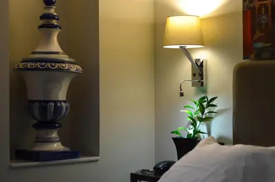 Cama o camas de una habitación en Aguilas5 SevillaSuites