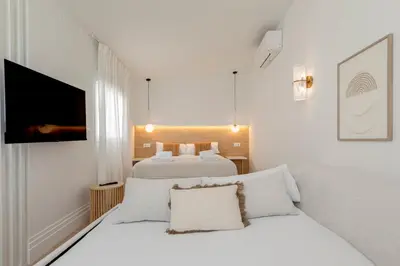Cama o camas de una habitación en ISG Apartments Faustino 45-3