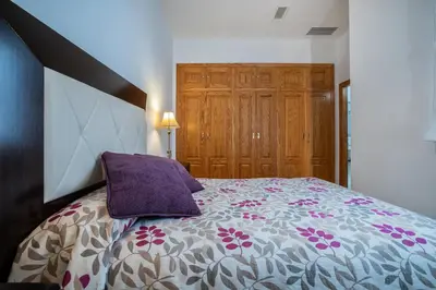 Cama o camas de una habitación en Kurtuba Suites