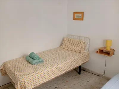 Cama o camas de una habitación en Town house with rooftop terrace