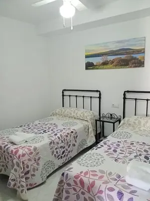 Cama o camas de una habitación en Casa Rural Aguilar