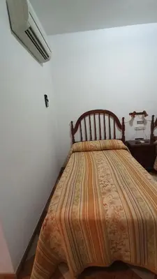Cama o camas de una habitación en Hostal Algaidas