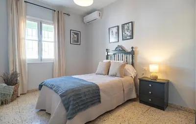 Cama o camas de una habitación en La Casa Del Limonero