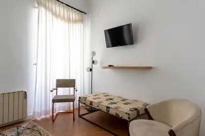 Una televisión o centro de entretenimiento en G8 Casa San Bernardo Calle Guadaira