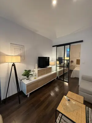 Una televisión o centro de entretenimiento en Apartamento Azonaicas