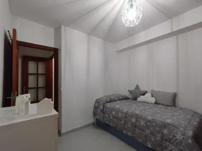Cama o camas de una habitación en La Rosa de Carmen