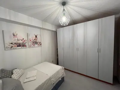 Cama o camas de una habitación en La Rosa de Carmen