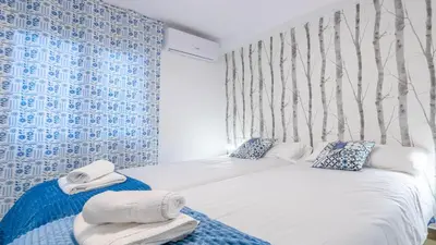 Cama o camas de una habitación en El Alma del Alcazar