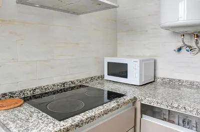 Una cocina o zona de cocina en Apartamento amplio