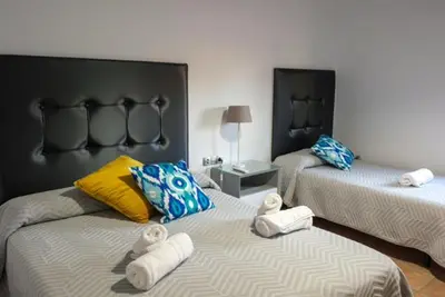 Cama o camas de una habitación en Casa Rural Alés