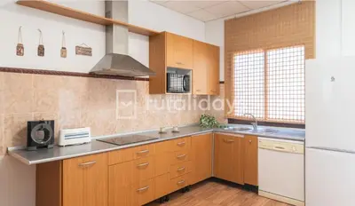 Una cocina o zona de cocina en Villa Dehesa Olive