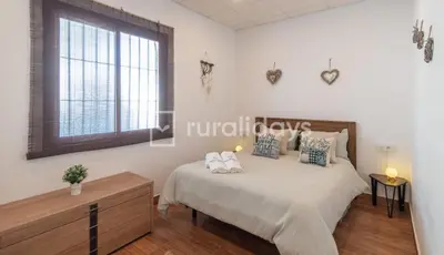 Cama o camas de una habitación en Villa Dehesa Olive
