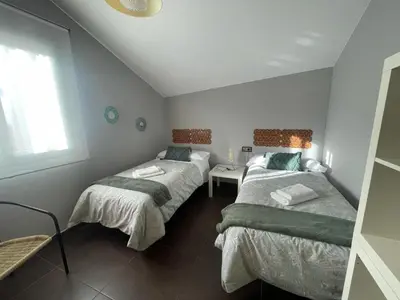 Cama o camas de una habitación en Donde habita el olvido