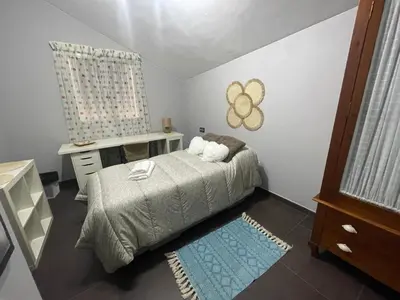 Cama o camas de una habitación en Donde habita el olvido