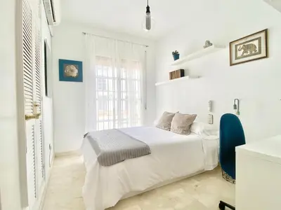 Cama o camas de una habitación en Apartamento Andalucía Centro III